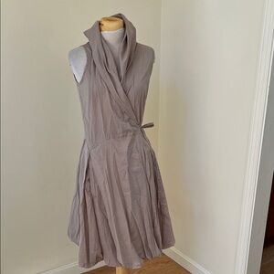 Entrata medium tan wrap flowy pleated dress with pockets.